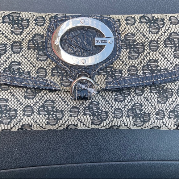 GUESS Black and Cream Patterned Clutch - Picture 1 of 4